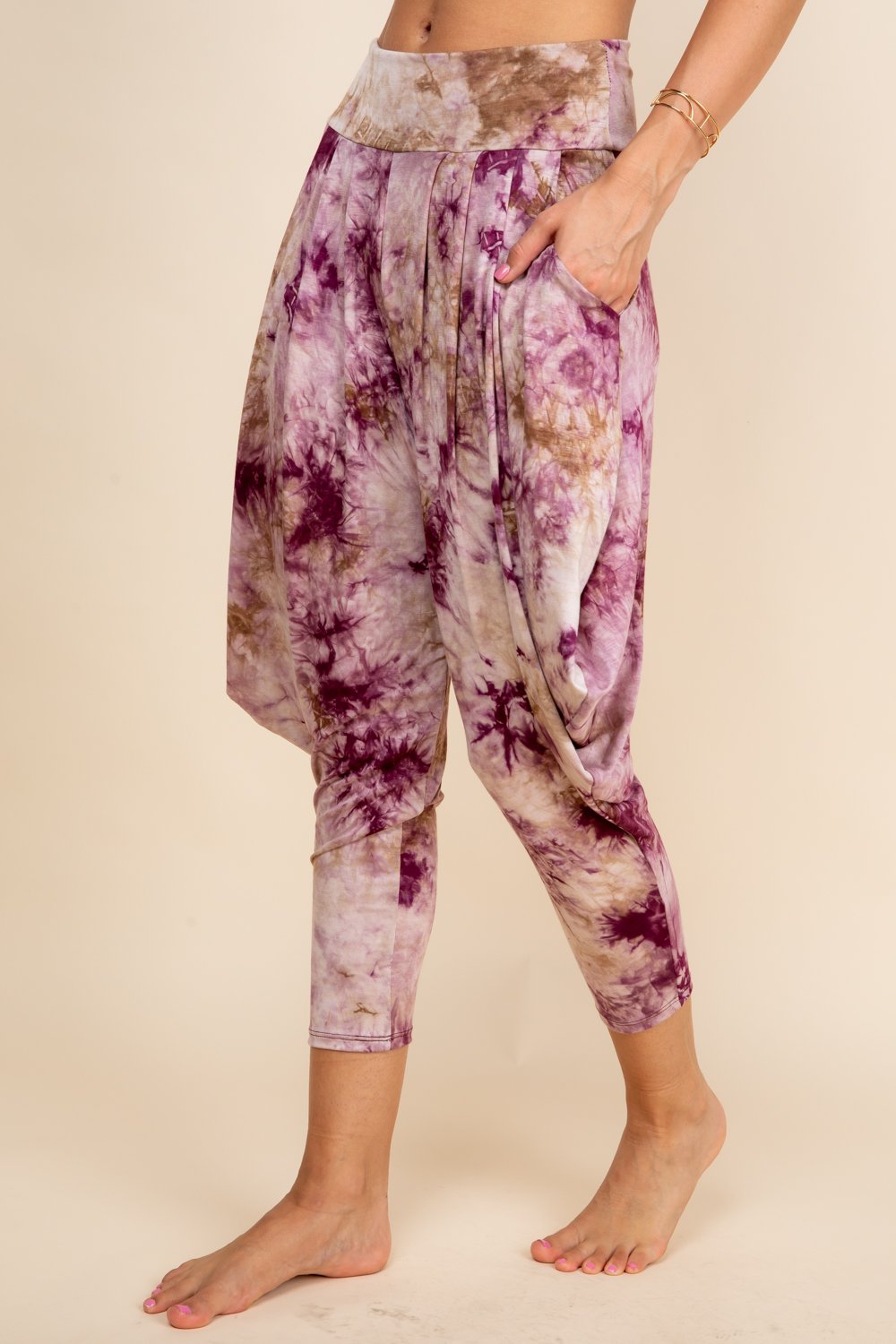 Side view of burgundy tie-dye women’s harem pants with stretch waistband – Kooniez brand