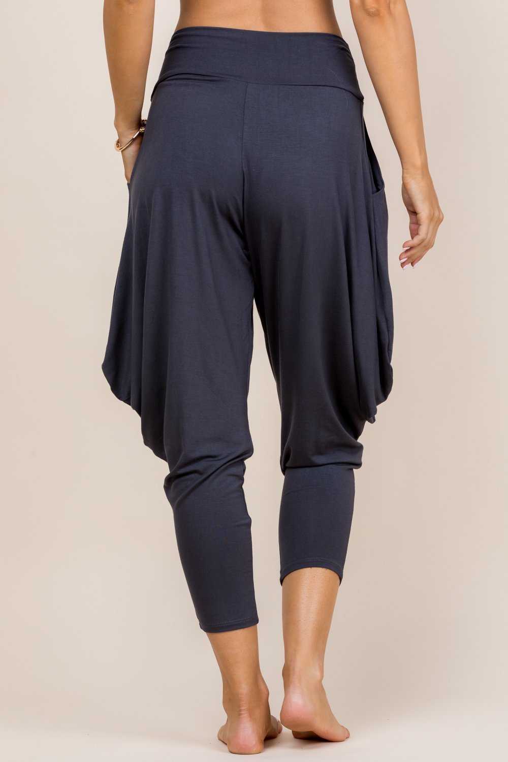 Back view of charcoal harem pants with adjustable hem and pockets – Kooniez