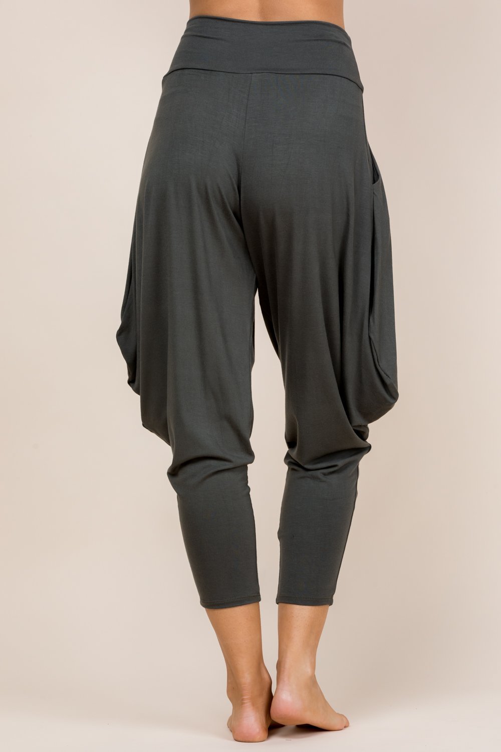Back view of olive harem pants with adjustable hem and pockets – Kooniez