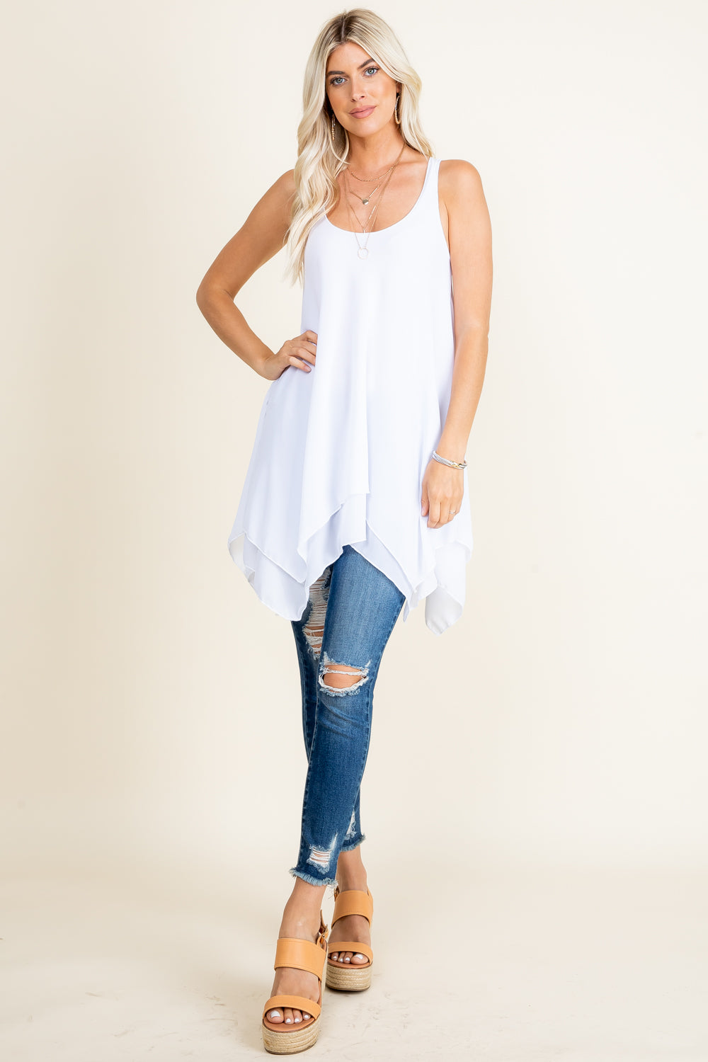 Full image of white swing tunic for women – sleeveless versatile top or dress
