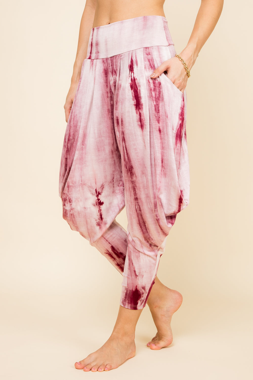 Side view of burgundy marble tie-dye women’s harem pants with stretch waistband – Kooniez brand