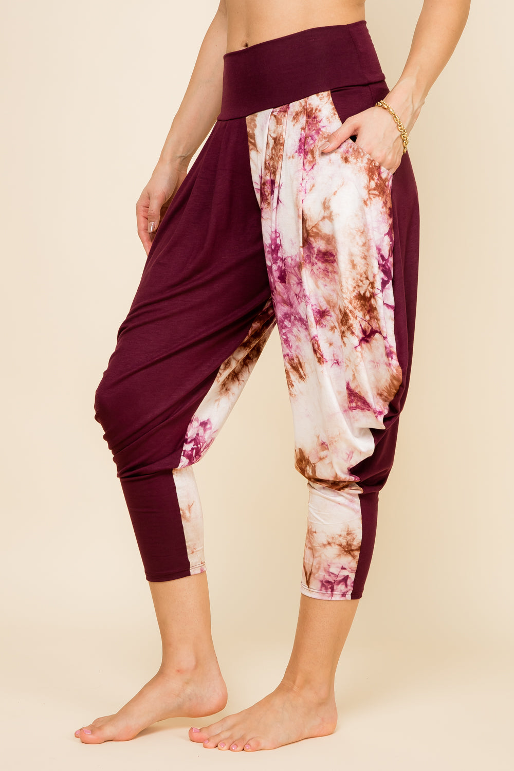 Side view of burgundy patchwork women’s harem pants with stretch waistband – Kooniez brand