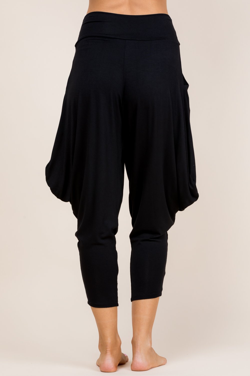 Back view of black harem pants with adjustable hem and pockets – Kooniez