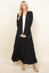 Front view of woman wearing black long pucker lace jacket – boho style, made in USA
