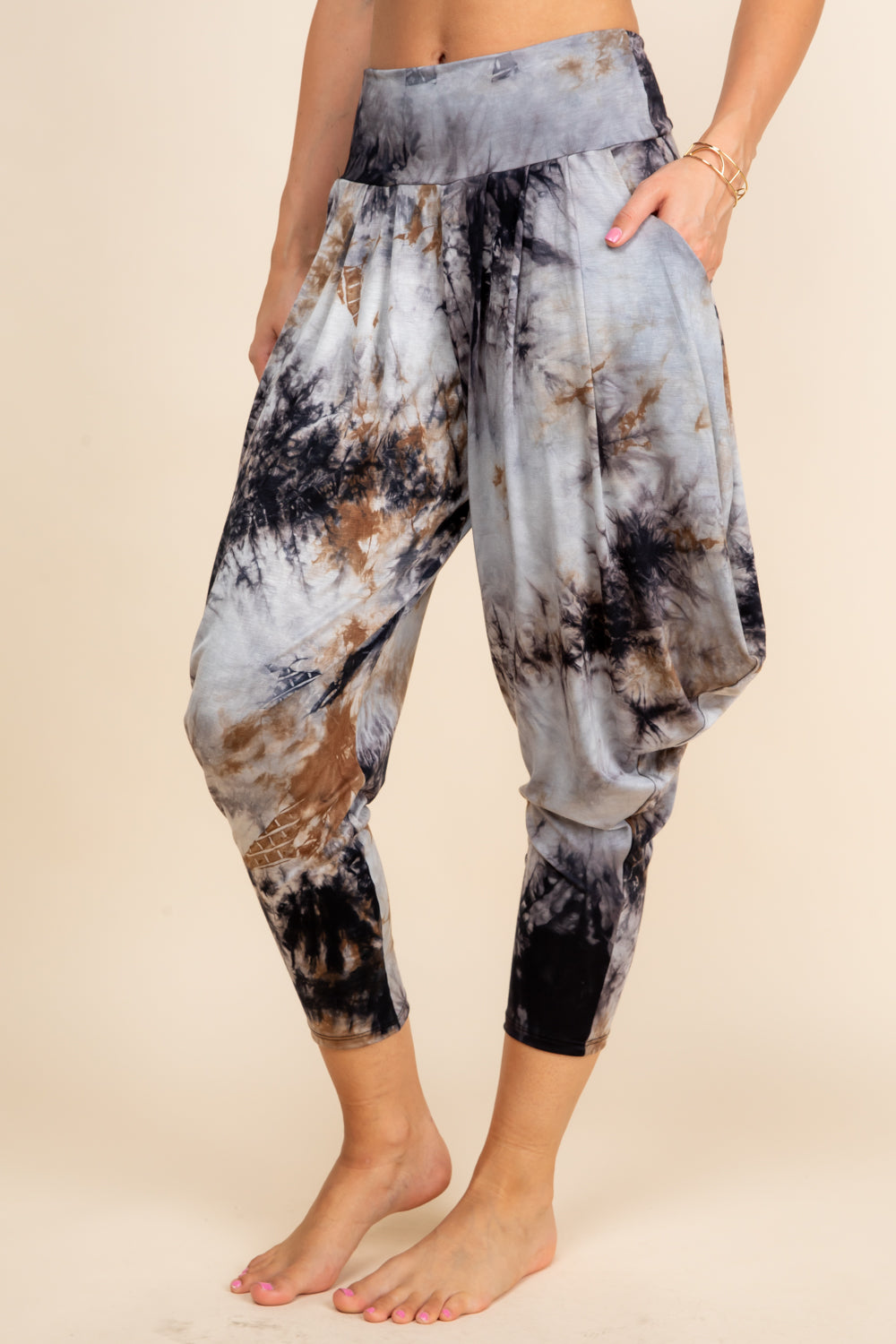 Back view of black tie-dye harem pants with adjustable hem and pockets – Kooniez