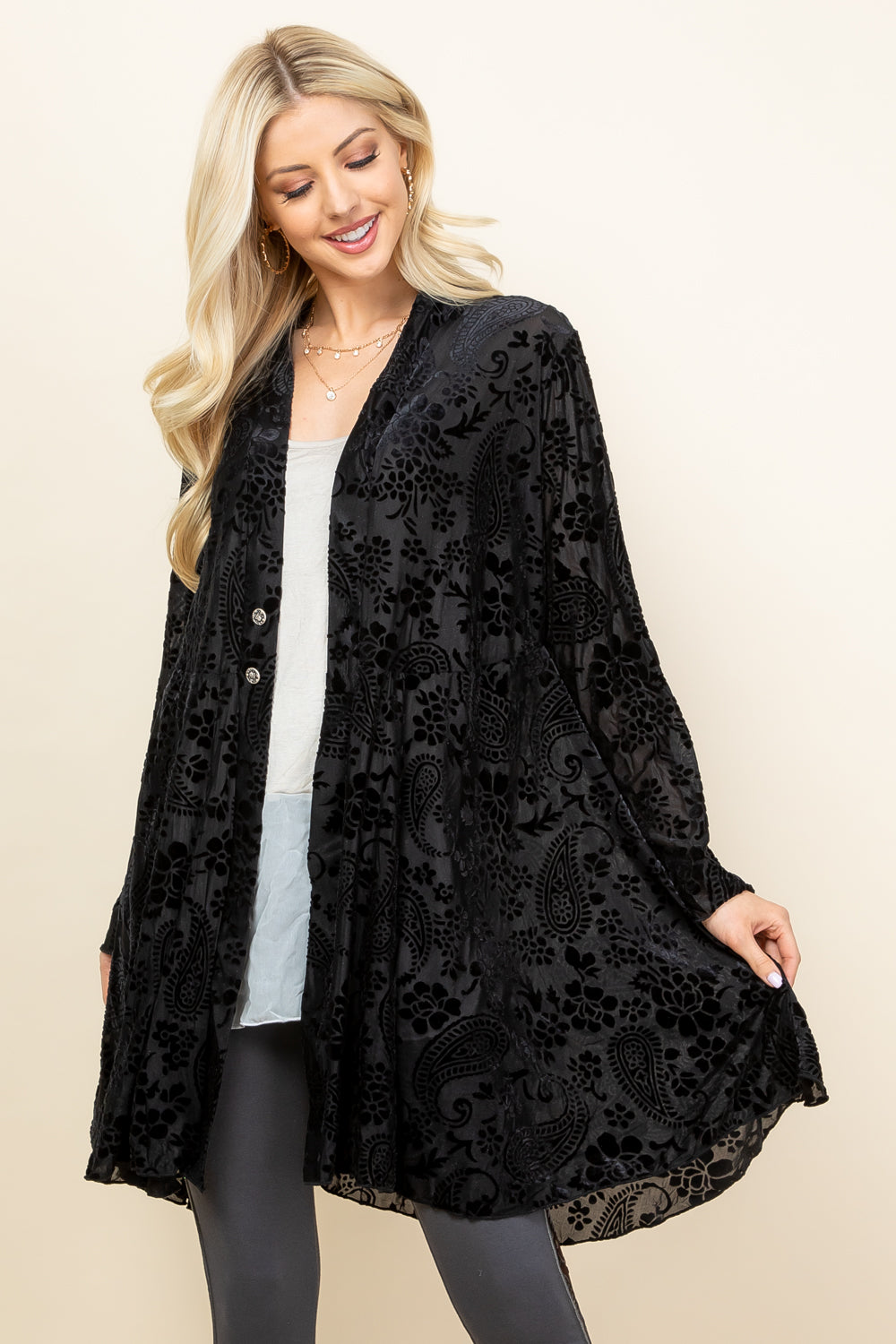 Front view of woman wearing black velvet paisley jacket – boho long sleeve outerwear, made in USA
