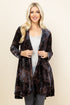 Front view of woman wearing brown velvet paisley jacket – boho long sleeve outerwear, made in USA