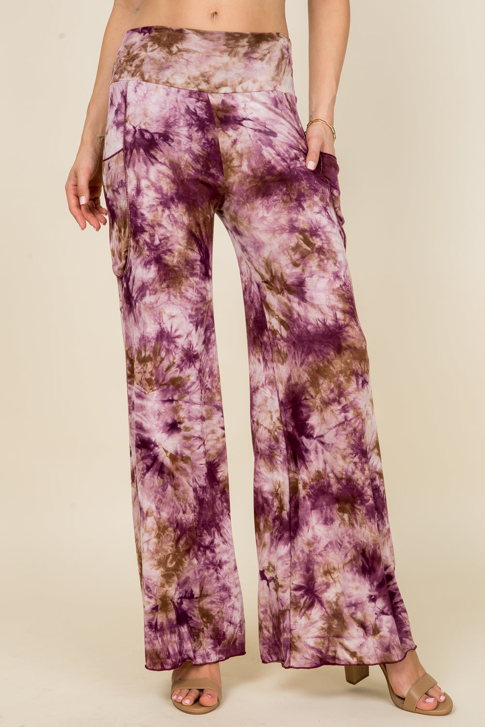 Front view of woman wearing burgundy tie-dye palazzo wide leg pants – flowy lounge style, made in USA