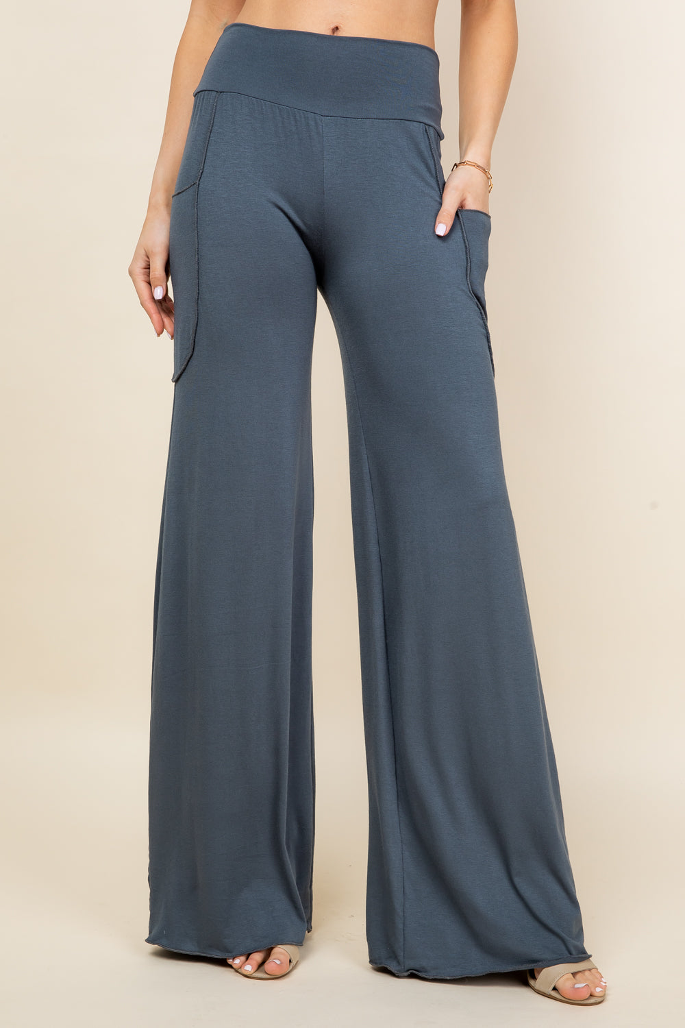 Front view of woman wearing charcoal palazzo wide leg pants – flowy lounge style, made in USA