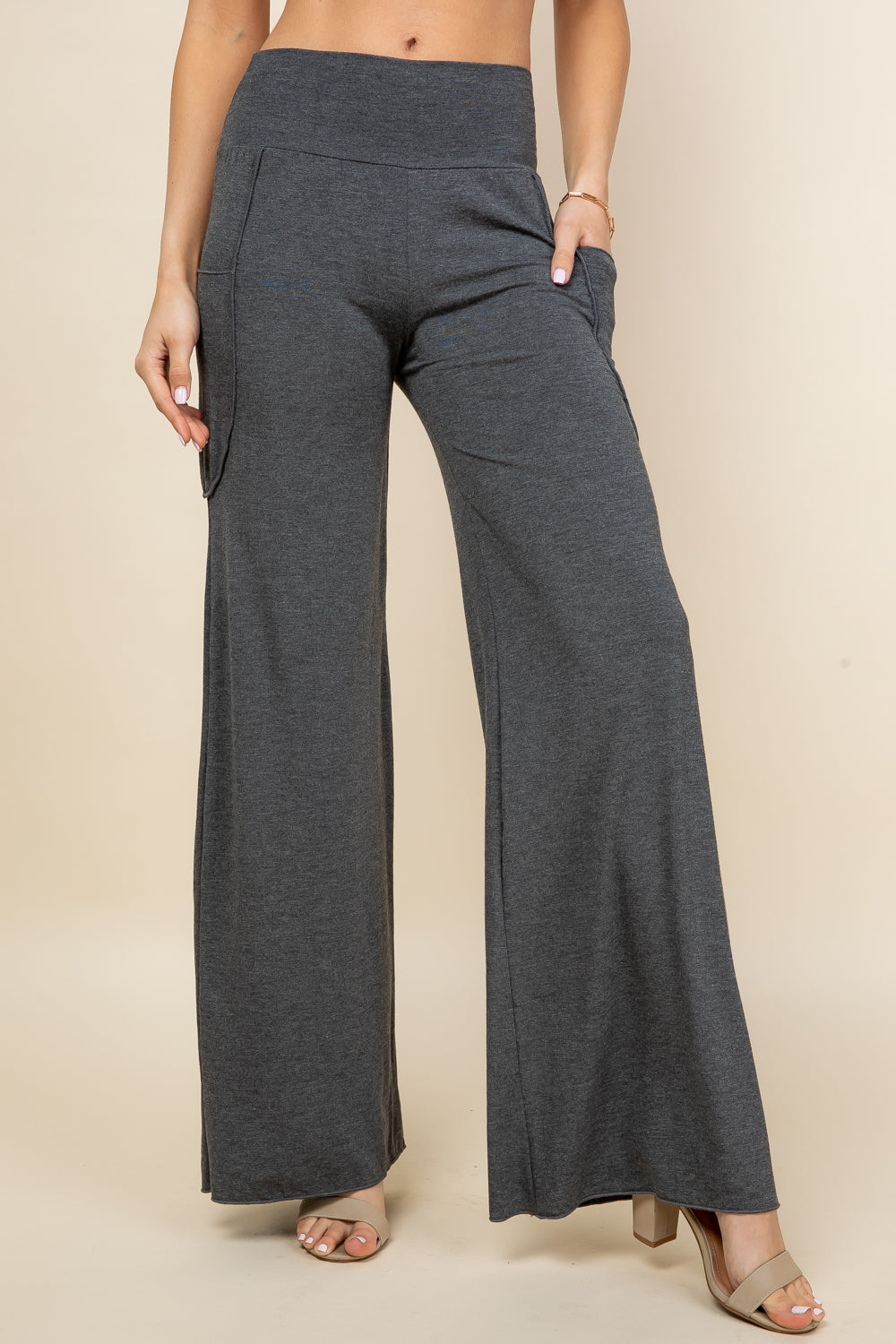 Front view of woman wearing dark heather palazzo wide leg pants – flowy lounge style, made in USA