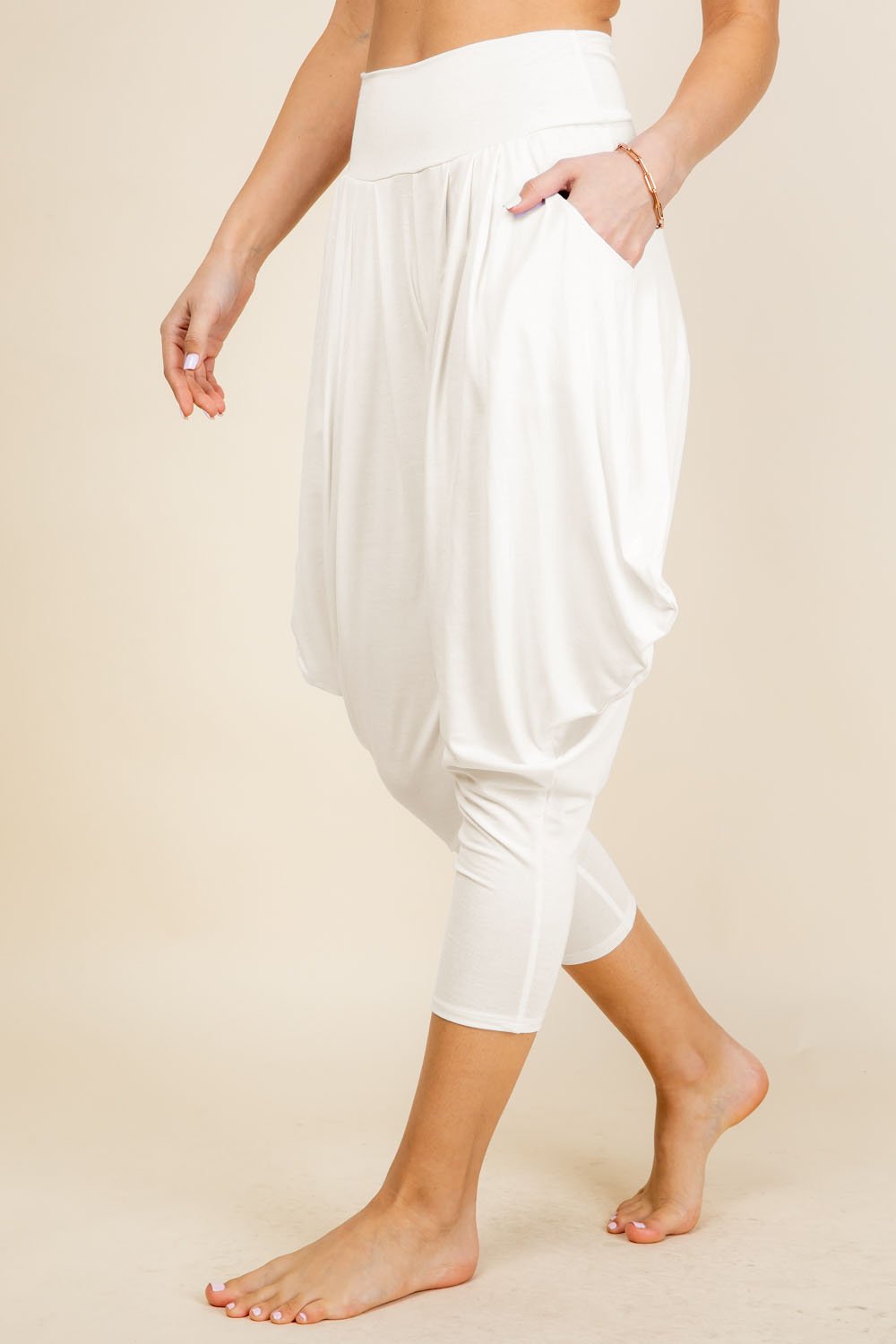 Side view of ivory women’s harem pants with stretch waistband – Kooniez brand