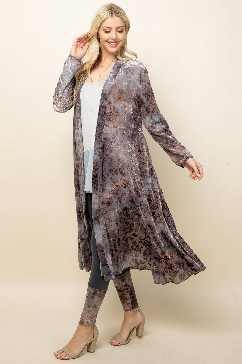 Front view of woman wearing light grey long velvet paisley jacket – boho duster, made in USA