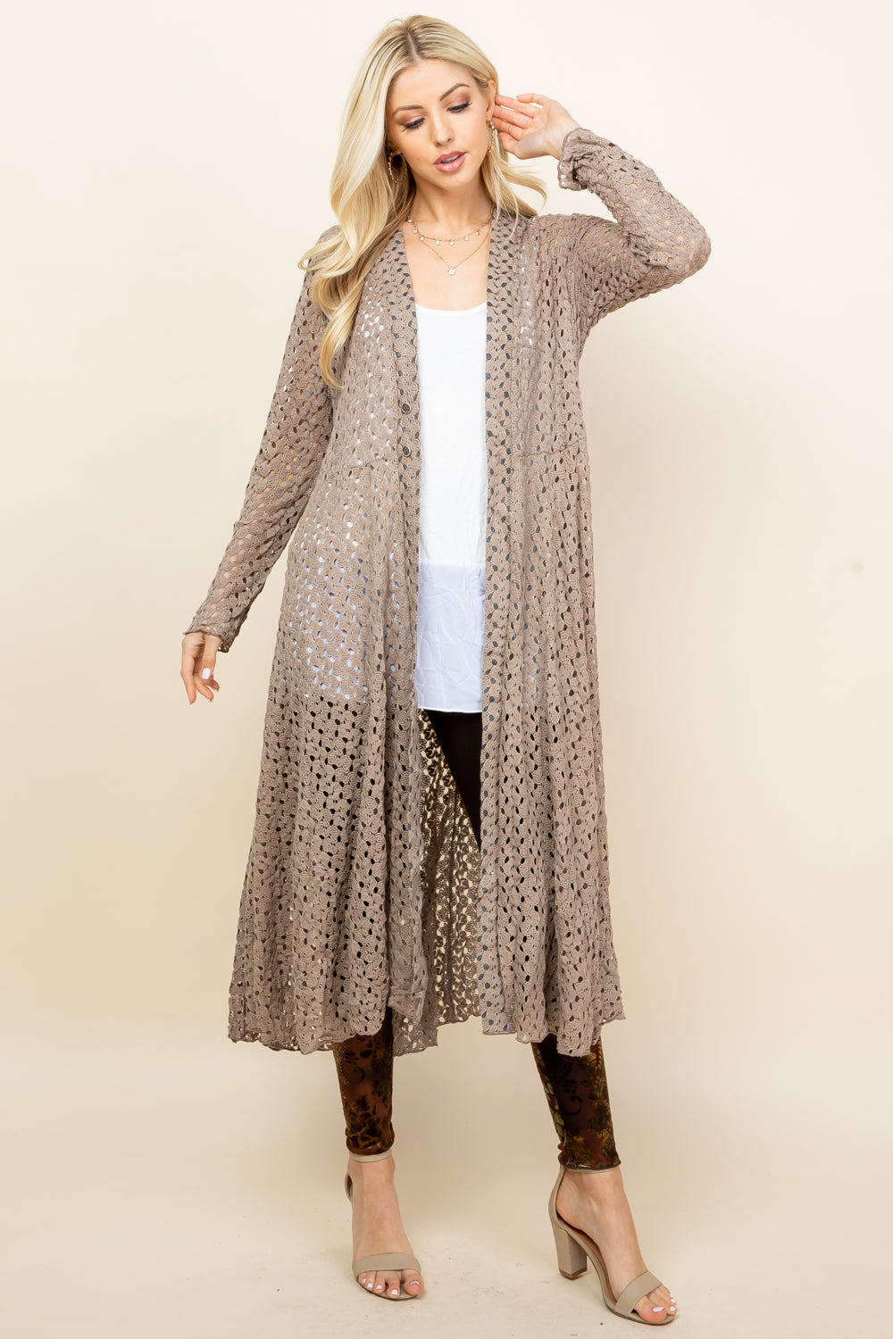 Front view of woman wearing mocha crochet lace long jacket – boho duster, made in USA
