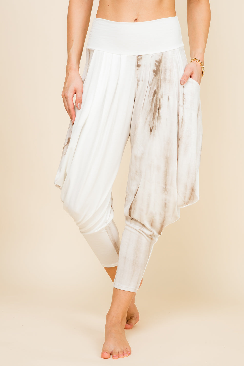 Front view of woman wearing mocha patchwork Kooniez harem pants with pockets – made in LA