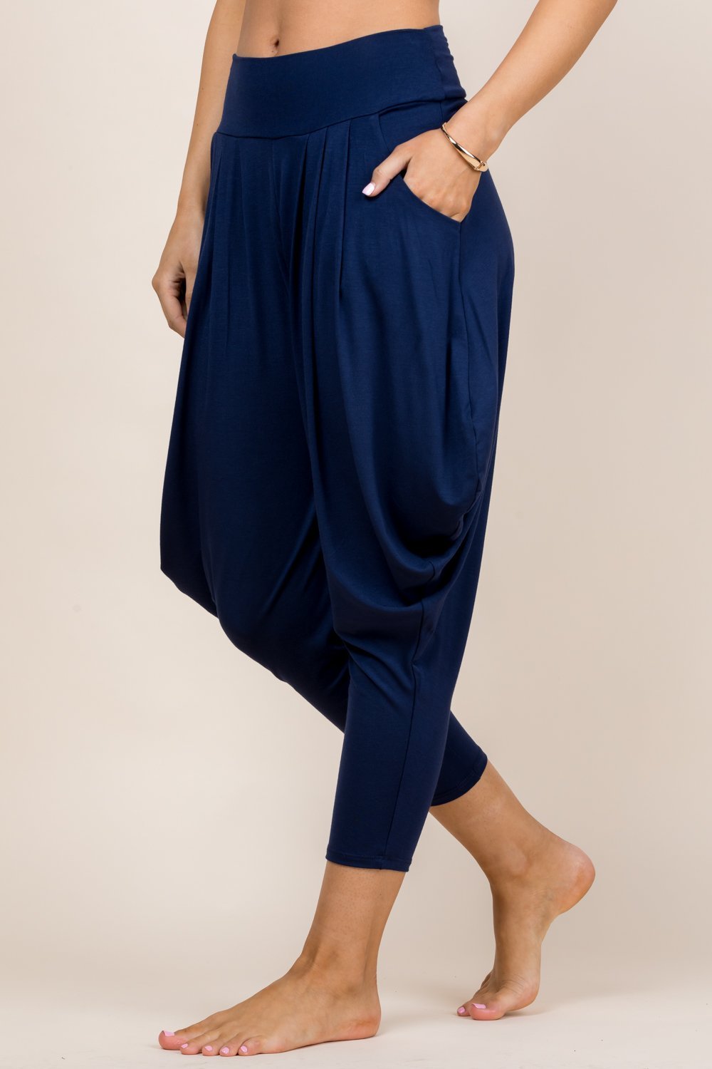 Side view of navy blue women’s harem pants with stretch waistband – Kooniez brand
