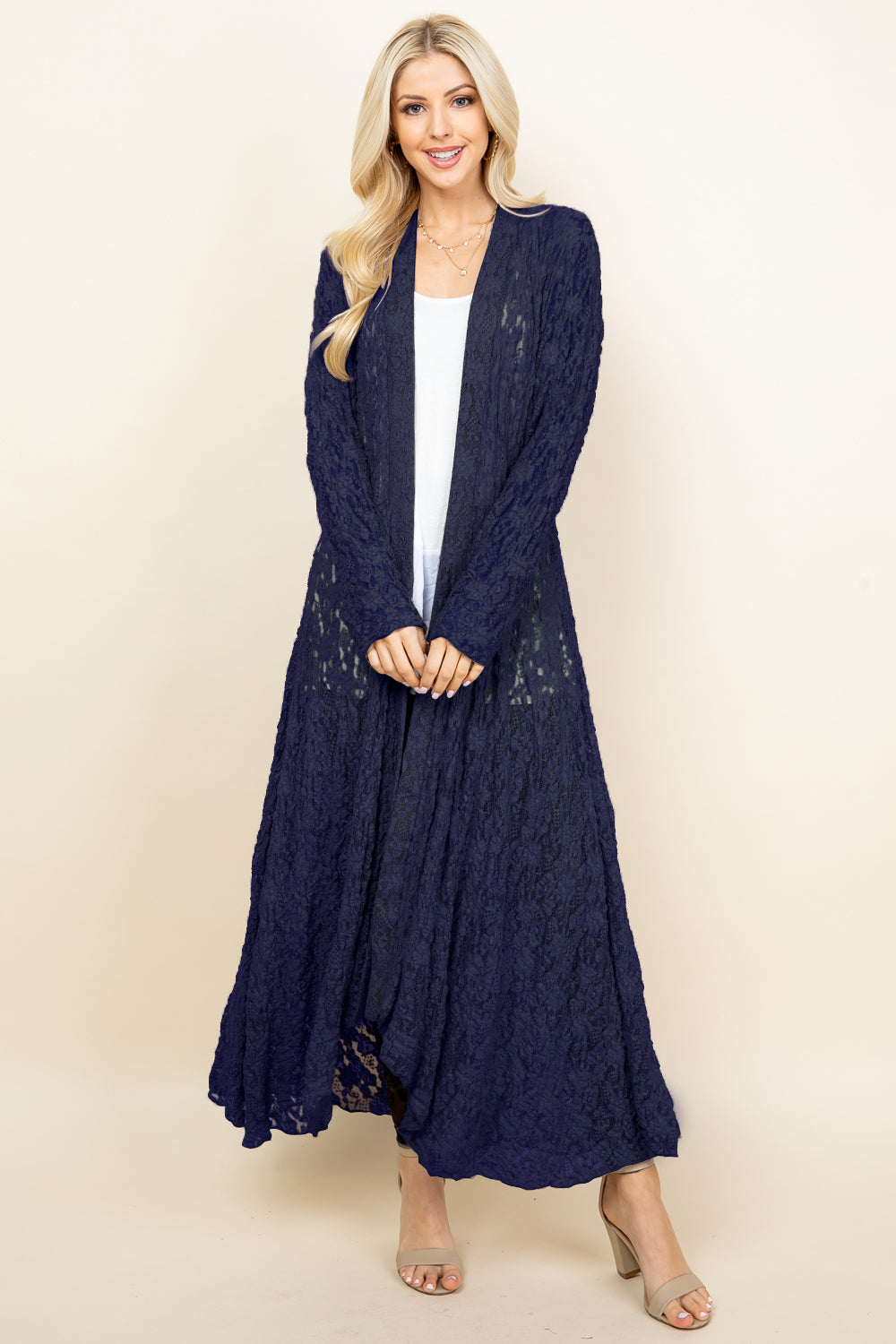 Front view of woman wearing navy blue long pucker lace jacket – boho style, made in USA