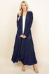 Front view of woman wearing navy blue long pucker lace jacket – boho style, made in USA