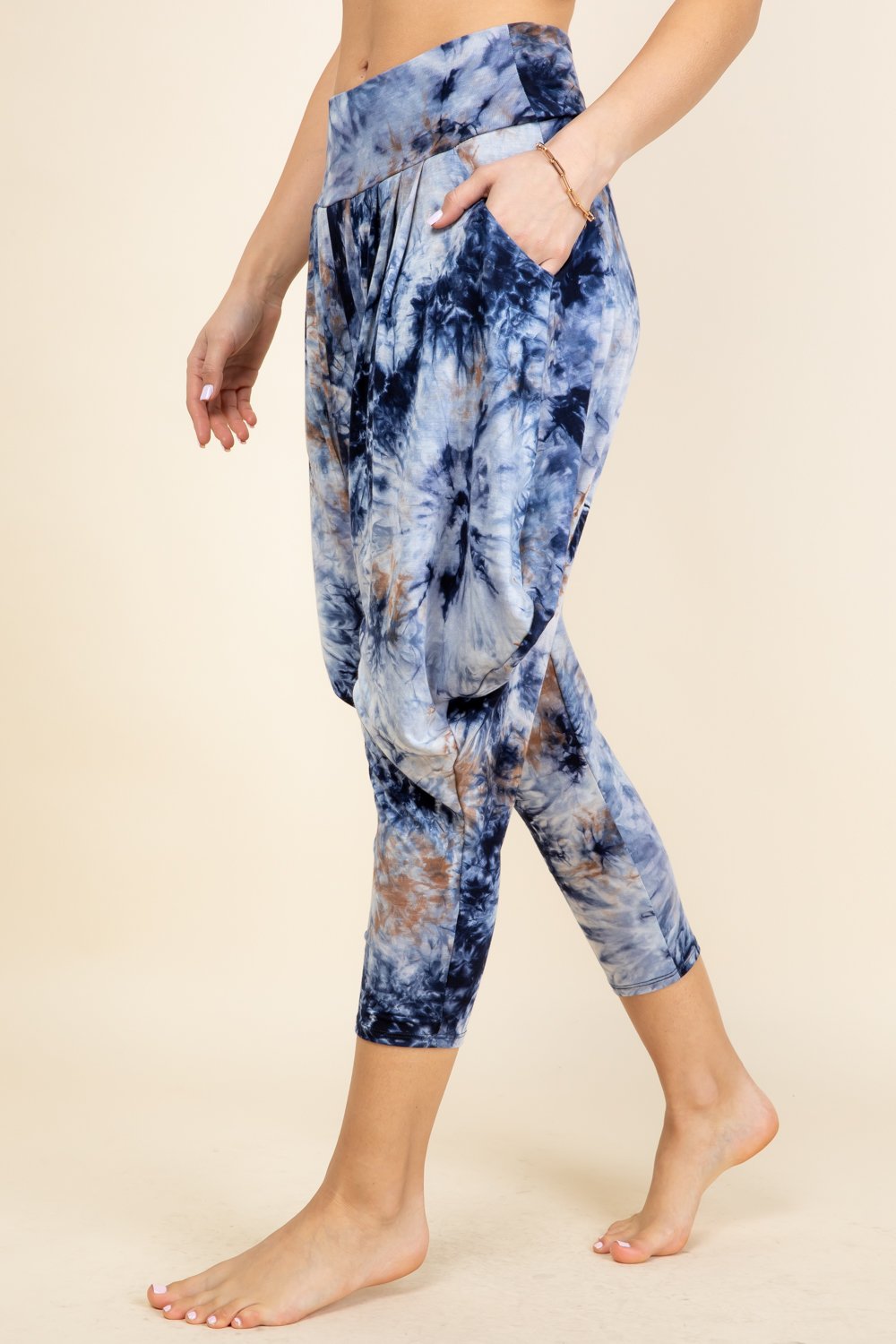 Side view of navy tie-dye women’s harem pants with stretch waistband – Kooniez brand