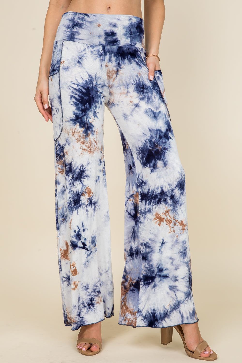 Front view of woman wearing navy tie-dye palazzo wide leg pants – flowy lounge style, made in USA
