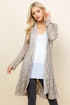 Front view of woman wearing oatmeal short pucker lace jacket – boho style, made in USA