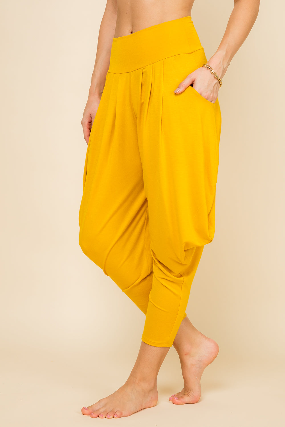 Side view of mustard women’s harem pants with stretch waistband – Kooniez brand