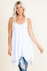 Front view of woman wearing white sleeveless swing tunic top – flowy and soft, made in USA