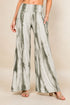 Front view of woman wearing navy tie-dye palazzo wide leg pants – flowy lounge style, made in USA