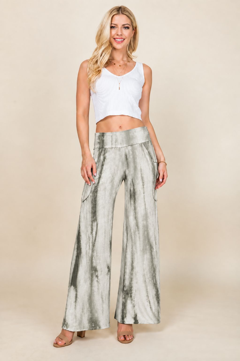 Full view of woman wearing olive marble tie-dye palazzo wide leg pants – flowy lounge style, made in USA