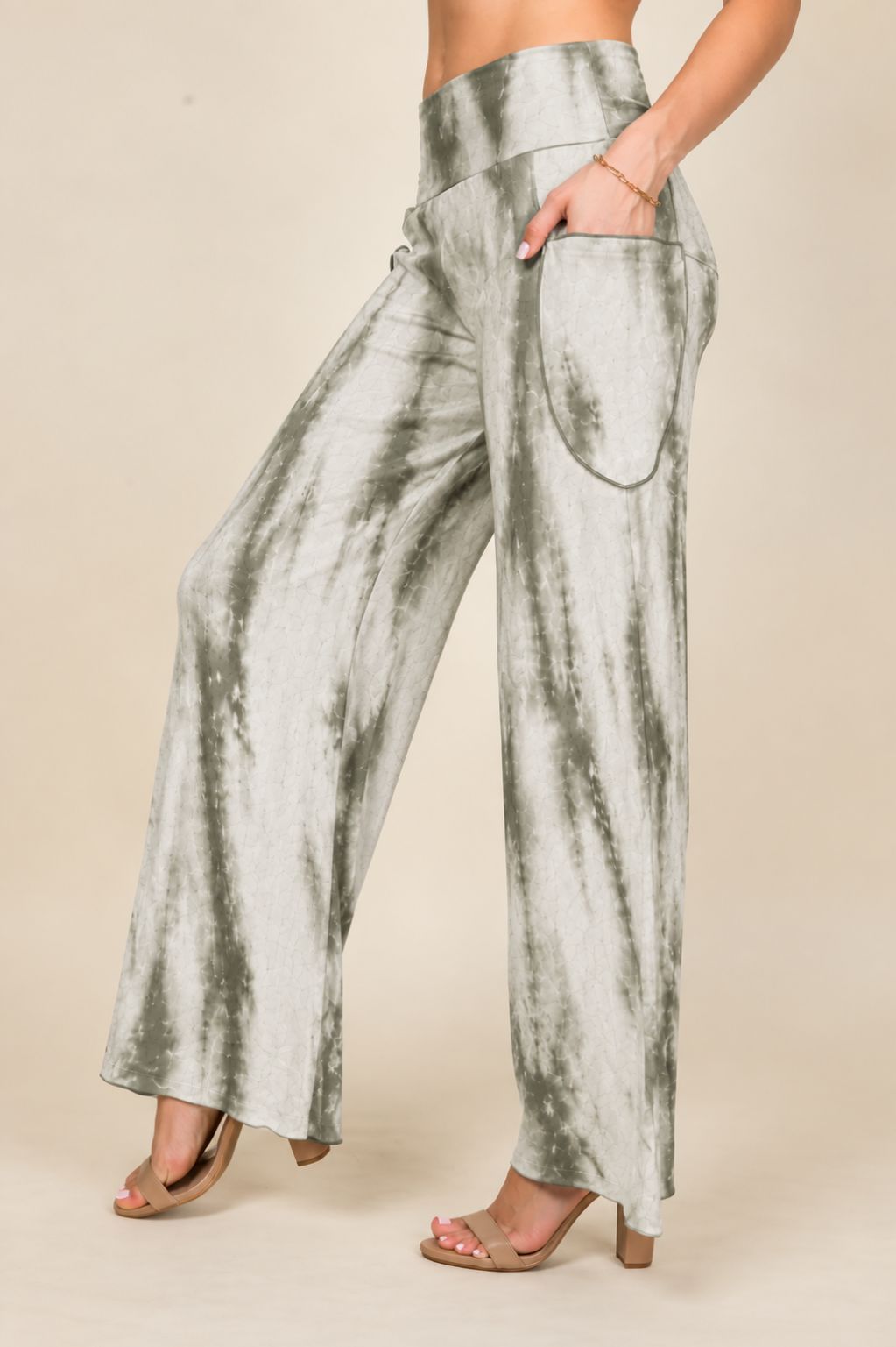 Side view of woman wearing olive marble tie-dye palazzo wide leg pants – flowy lounge style, made in USA