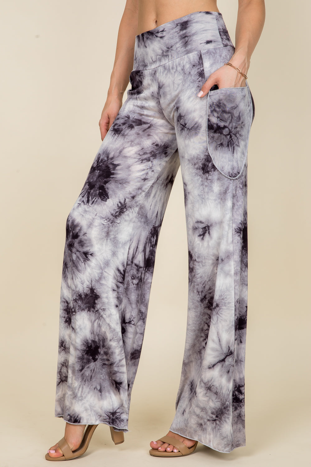 Side view of black and white tie-dye palazzo lounge pants – comfortable fit with stretch waistband