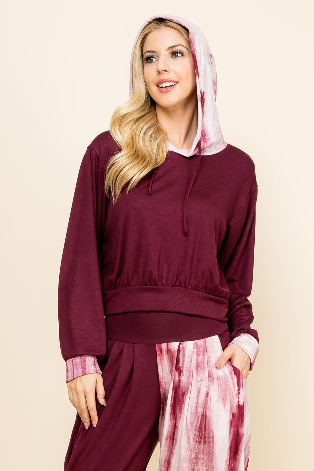 Front view of woman wearing burgundy marble tie-dye patchwork cropped hoodie – soft loungewear hoodie, made in USA