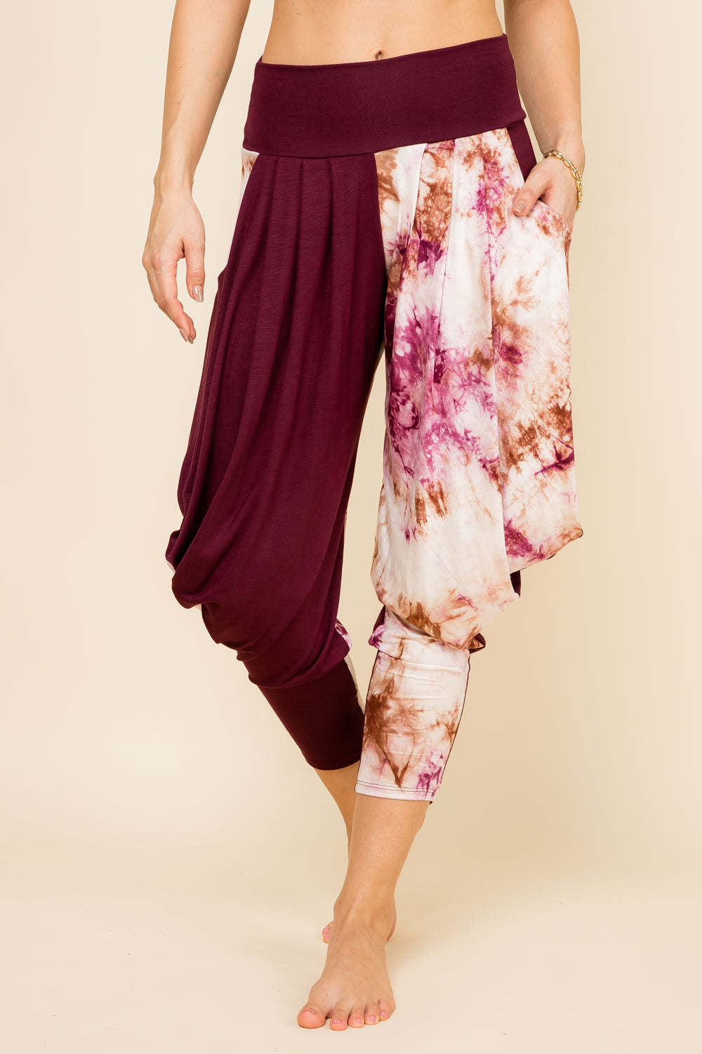 Front view of woman wearing burgundy patchwork Kooniez harem pants with pockets – made in LA