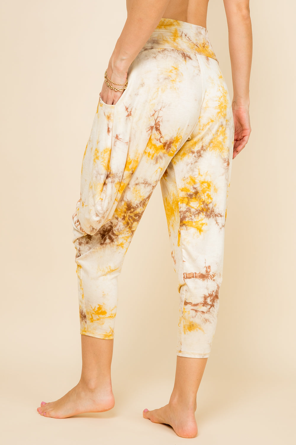 Back view of mustard tie-dye women’s harem pants with stretch waistband – Kooniez brand
